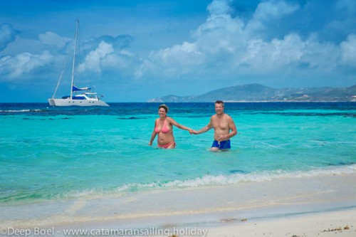 together in the turquoise waters of Mopion in the Grenadines