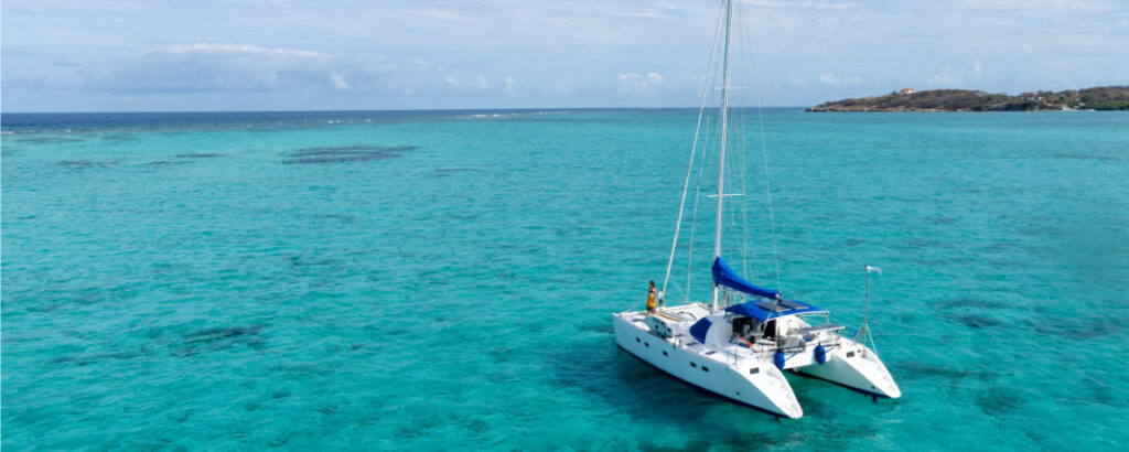 Yemaya-on-anchor-at-the-helm